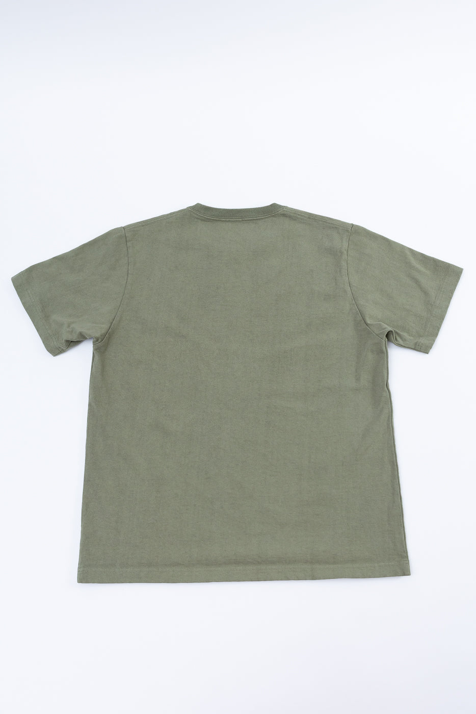 Green t-shirt on a white background