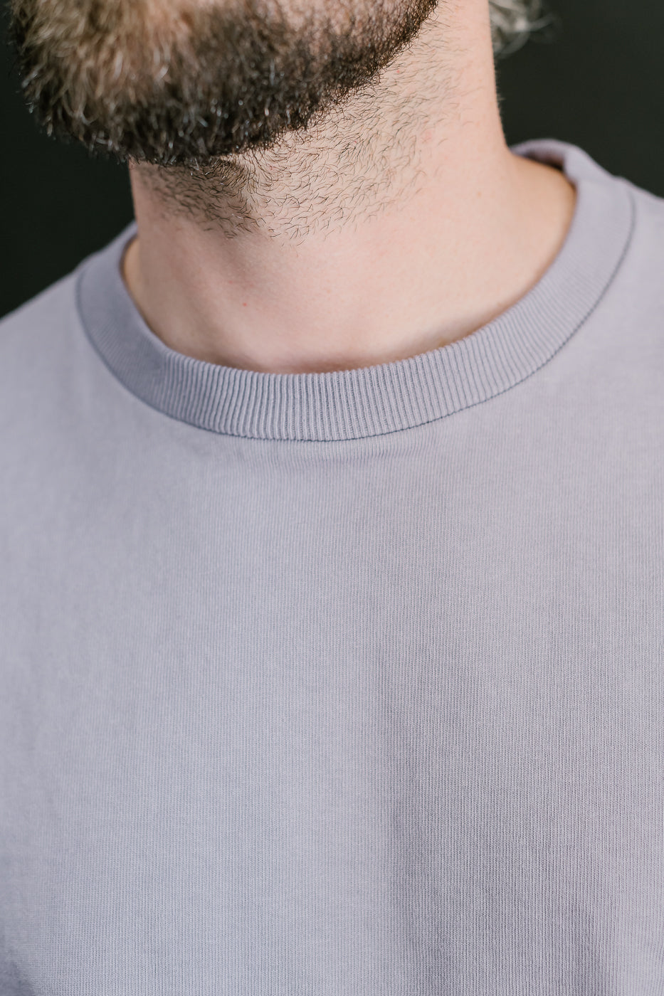 close up binder collar view of purple t-shirt showing ribbing