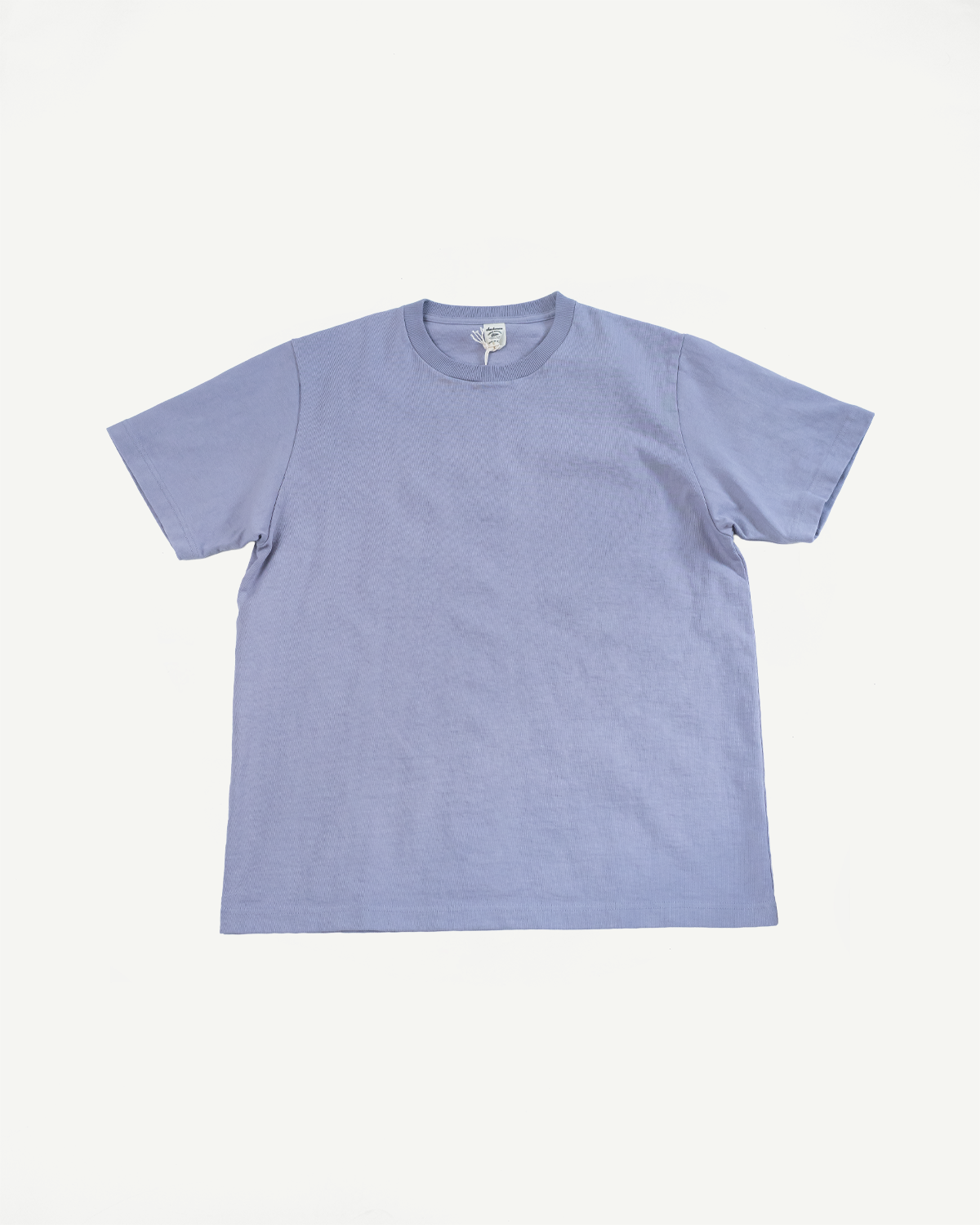 Plain light purple t-shirt on a white background