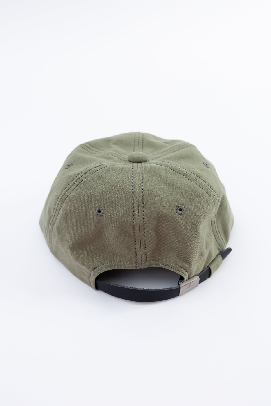 Green cap on a white background