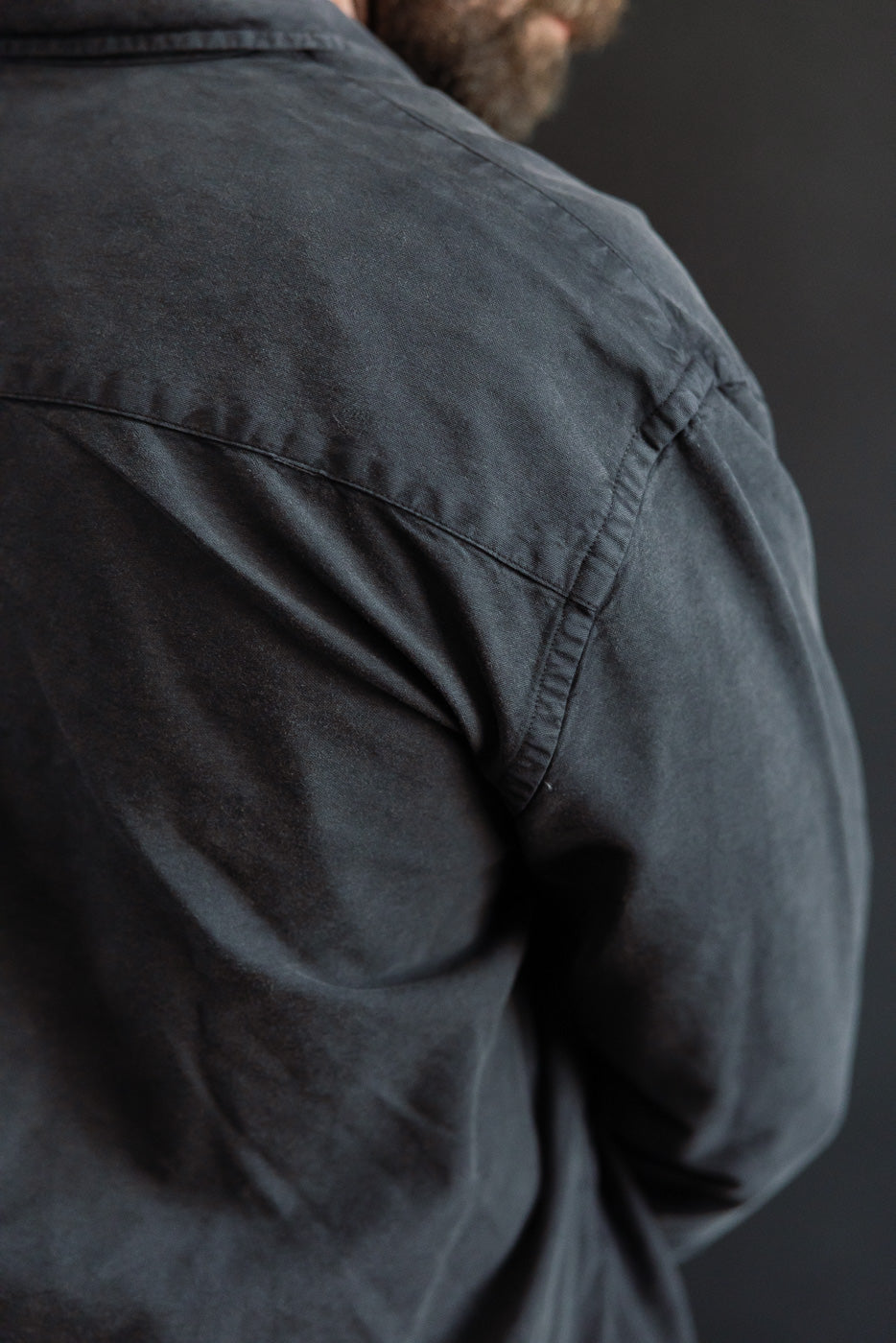 Close-up of vintage black oxford shirt back shoulder, male model 5'9