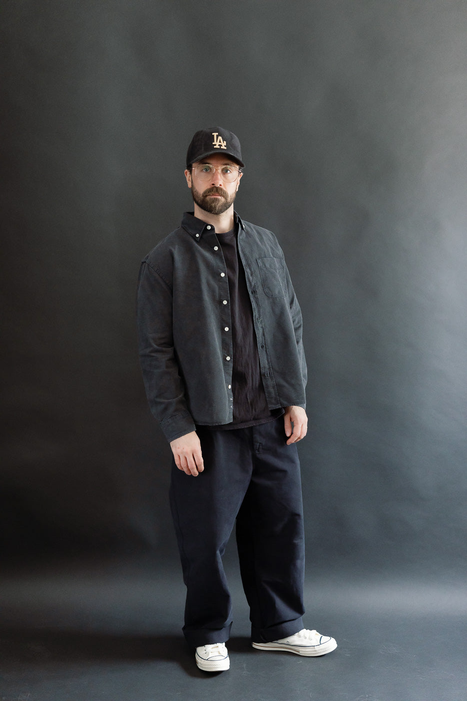 Full body front view of male model 5'9