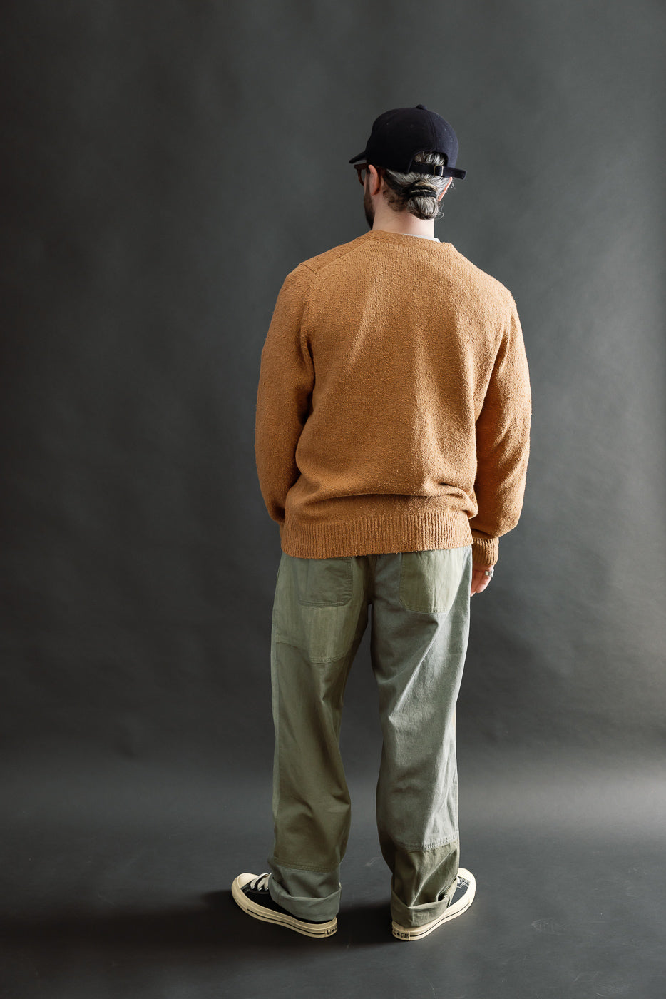 Full body rear view of male model 5'9
