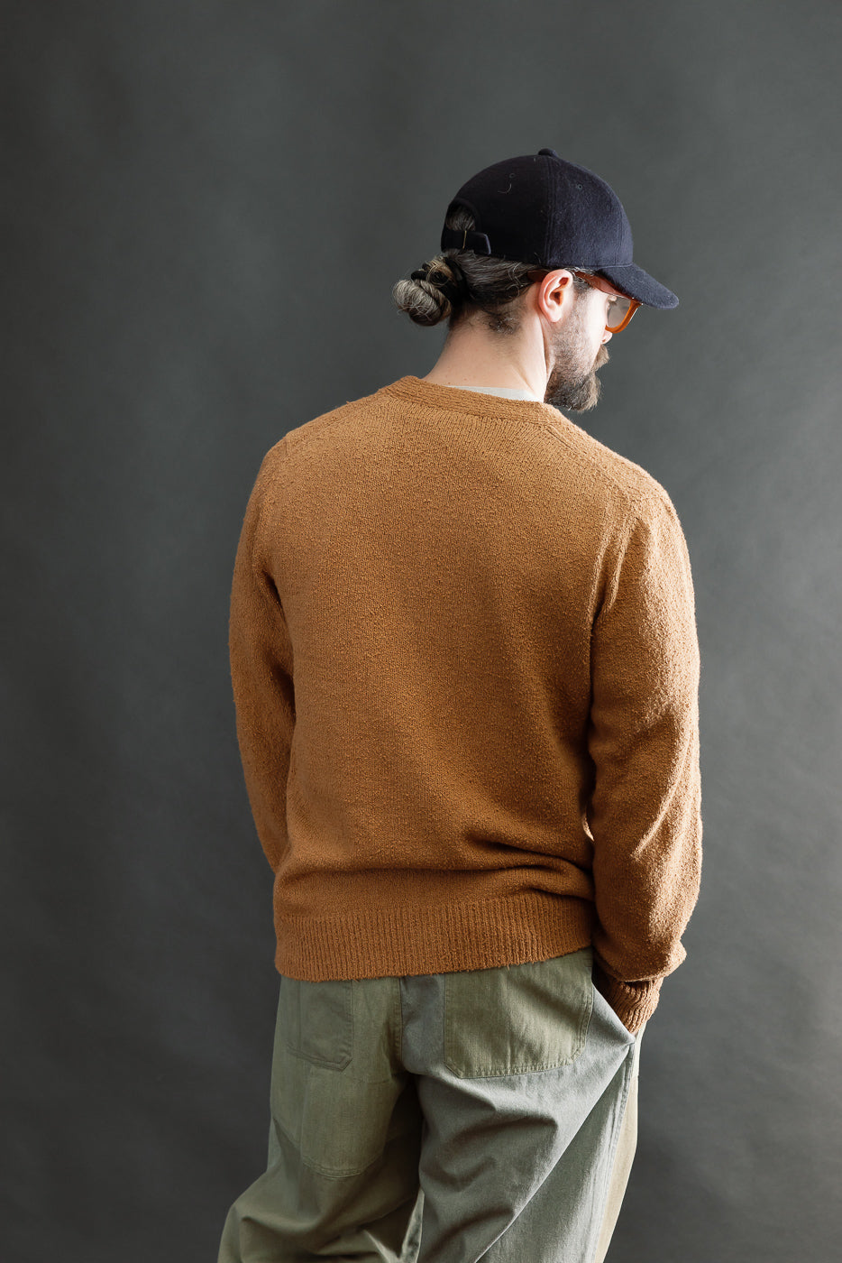 Back view, full body shot of male model 5'9