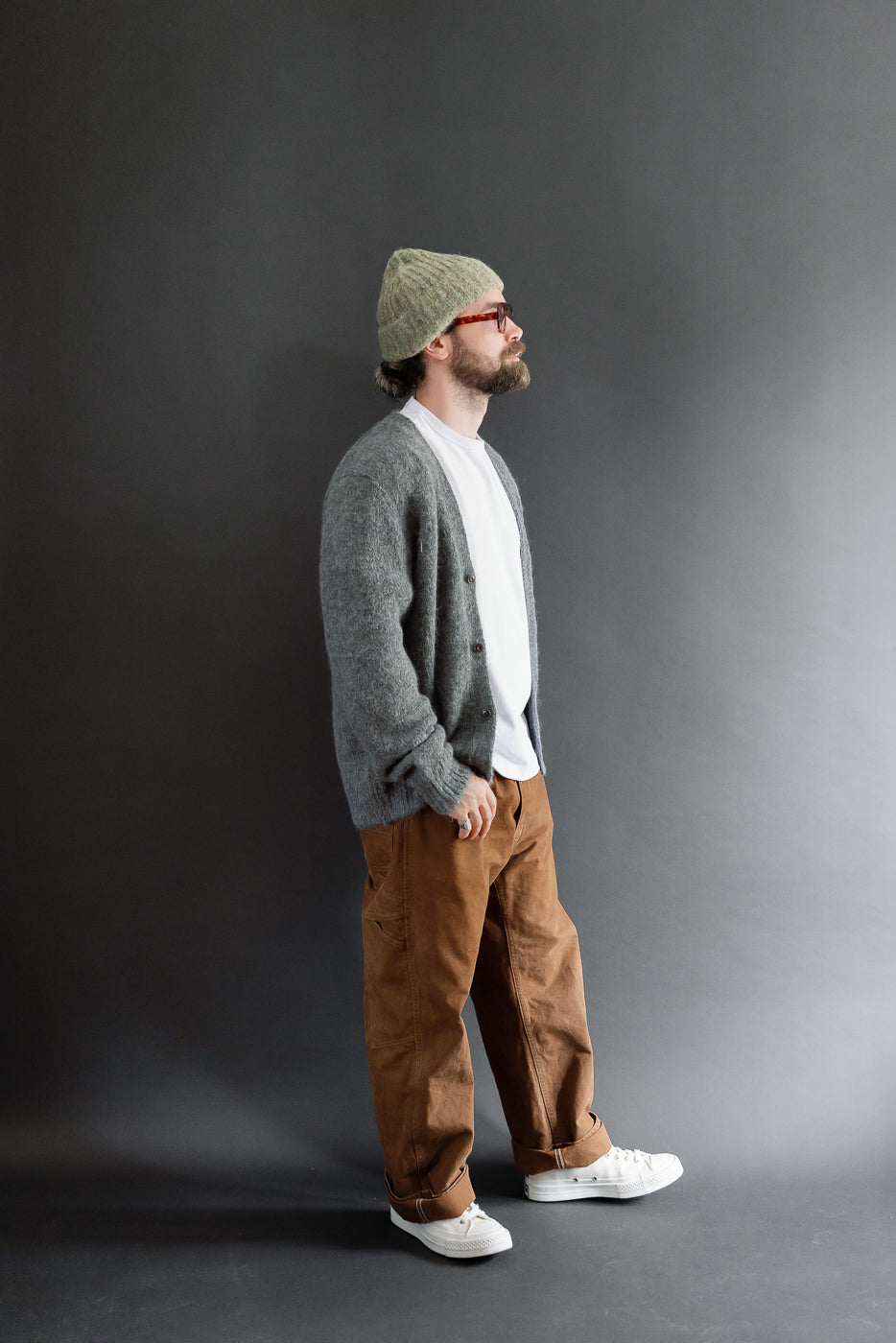 Full body side view of a male model (5'9