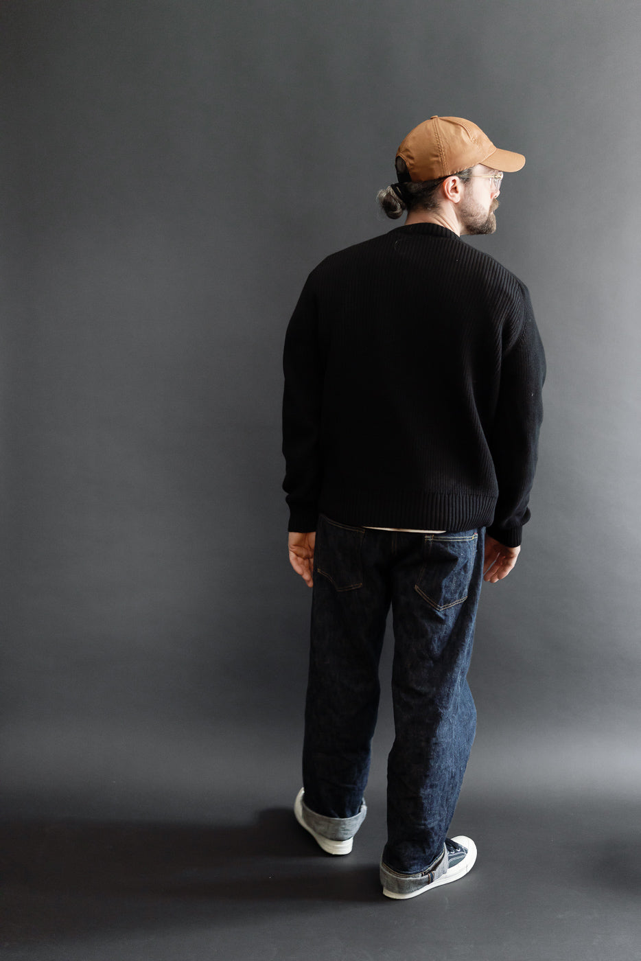Back view of full body shot: male model, 5'9