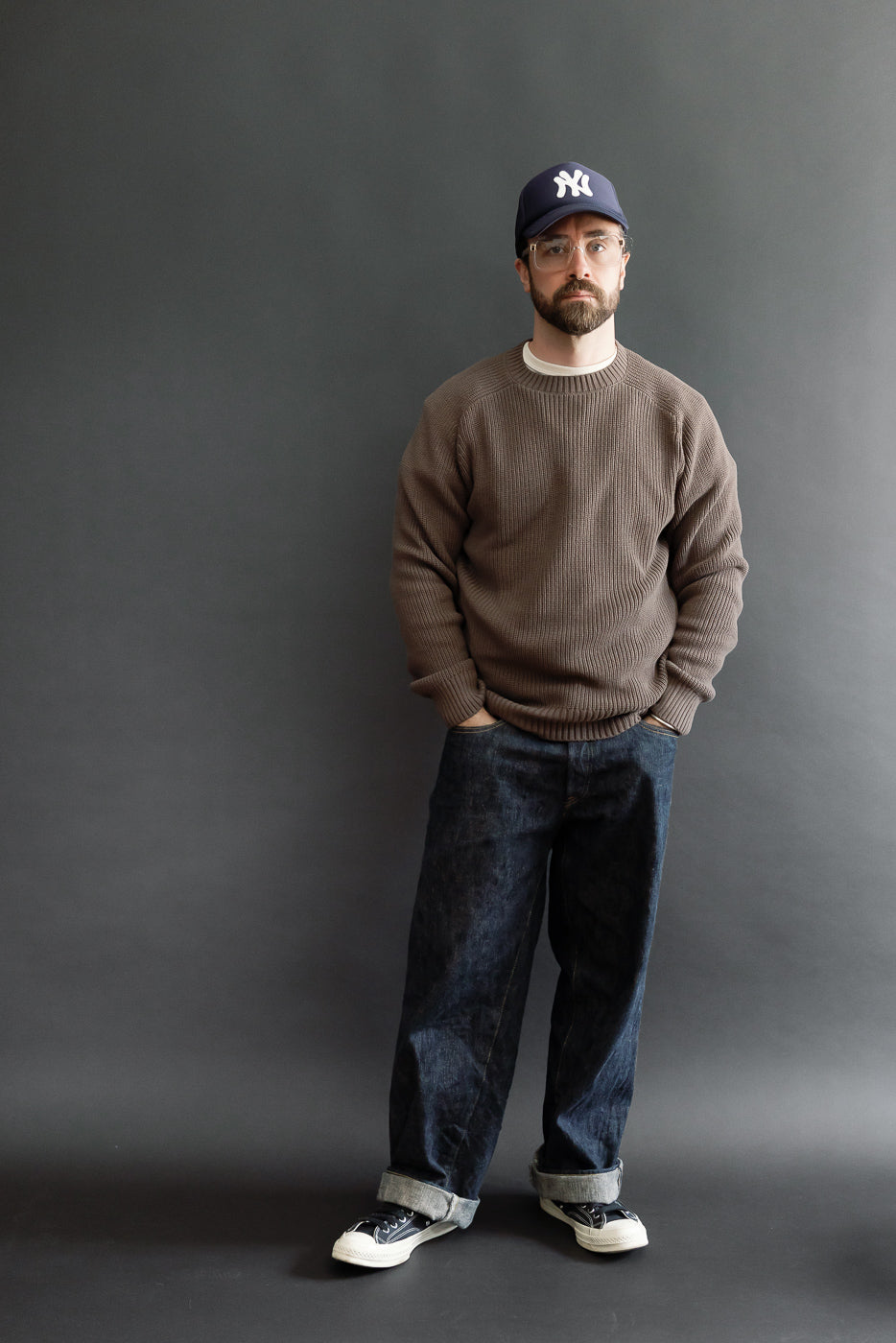 Full body front view of a male model, 5'9