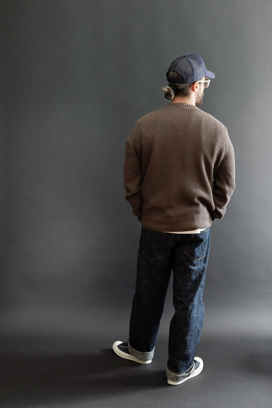 Full body back view of a male model, 5'9