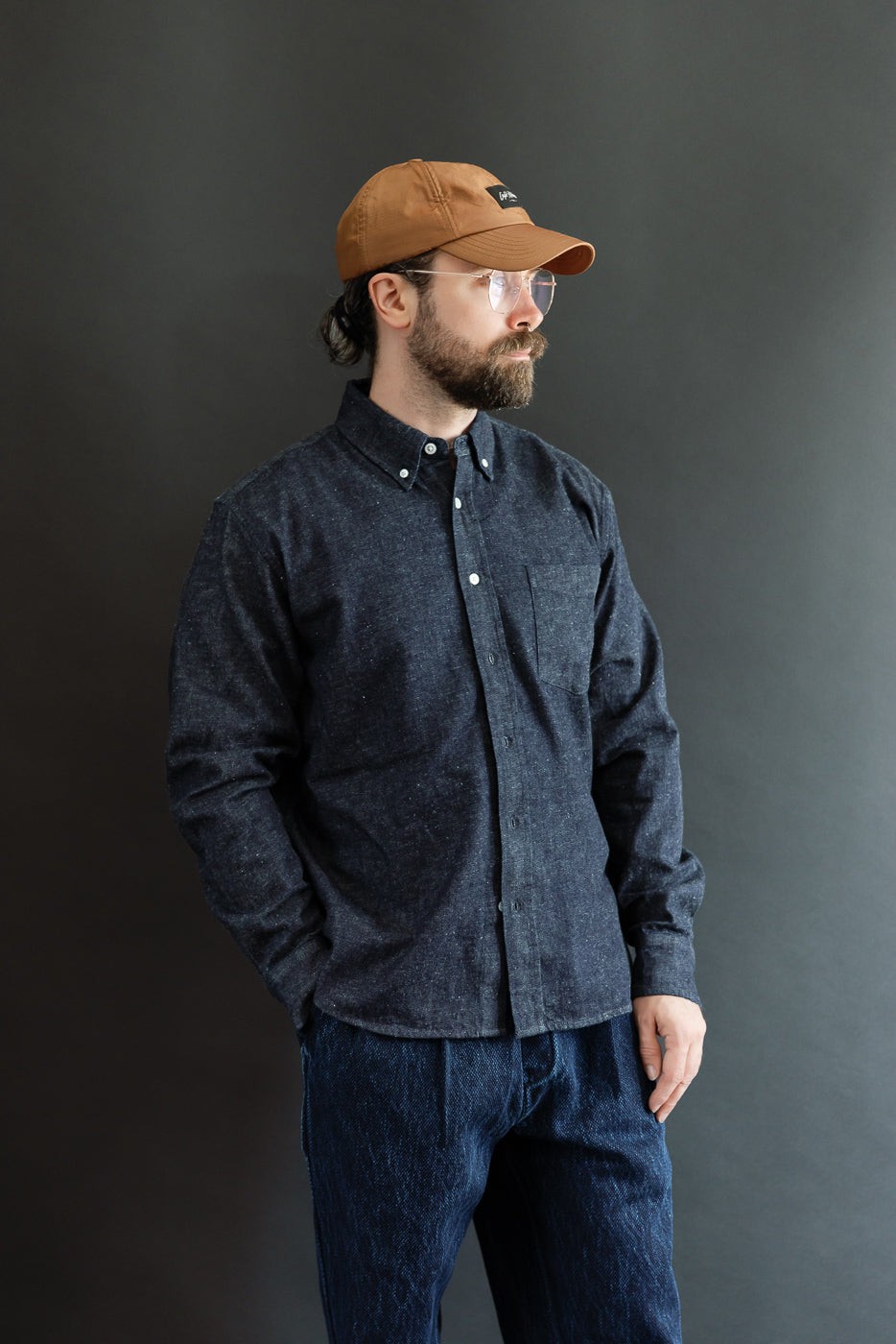 Full body side view of a male model, 5'9