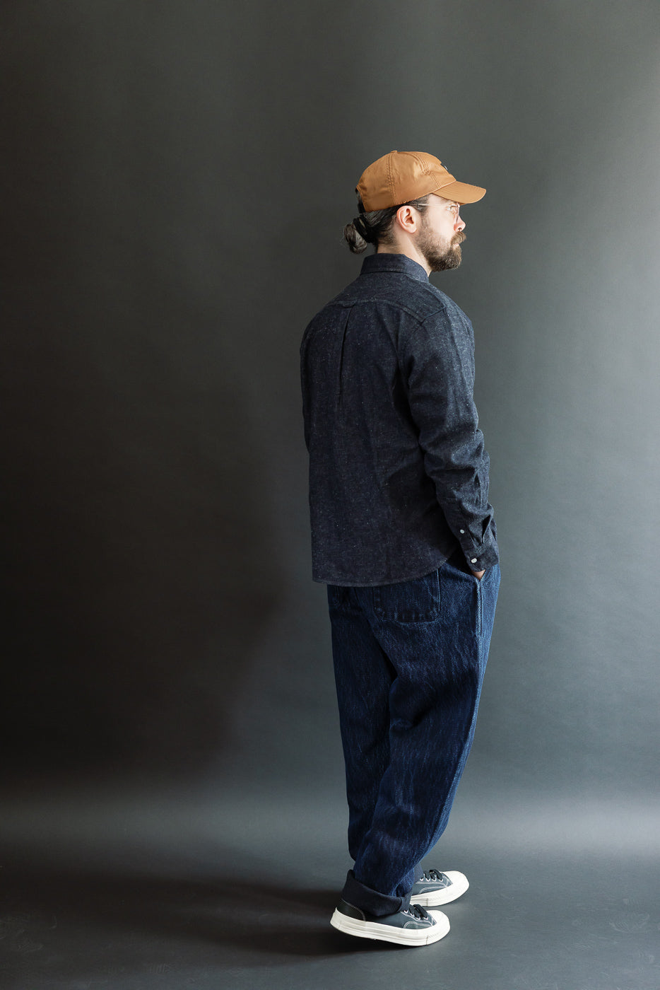 Full body side view of a male model, 5'9