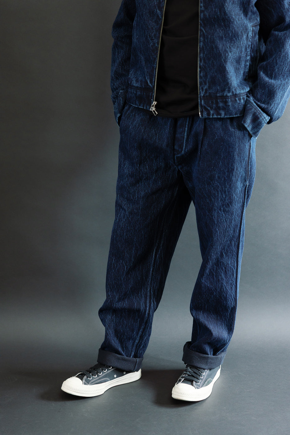 Full body front view of a male model, 5'9