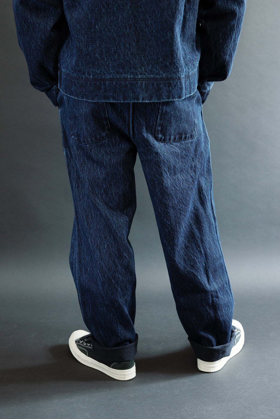 Full body back view of a 5'9