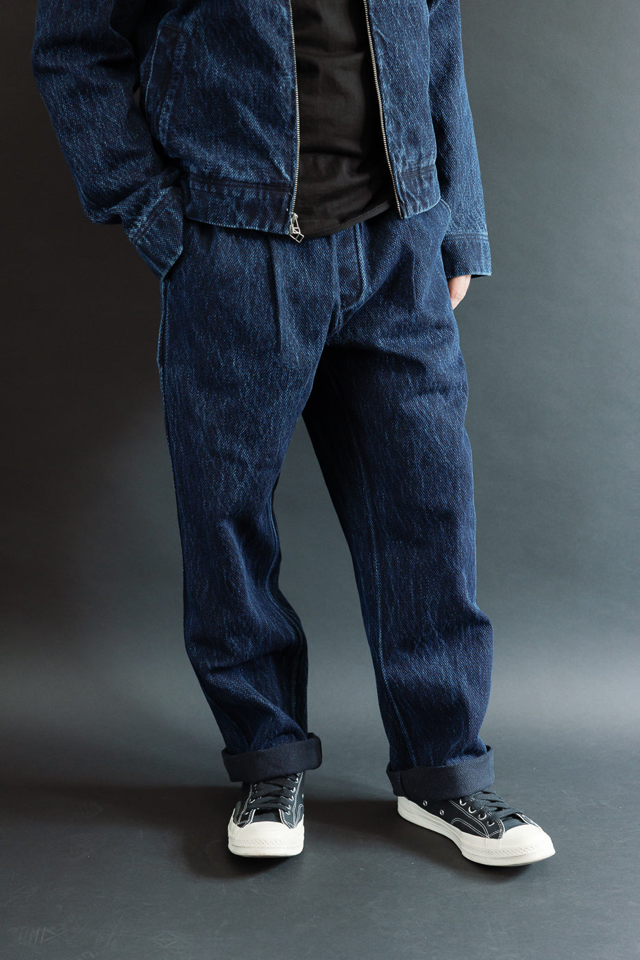 Full body front view of a male model, 5'9