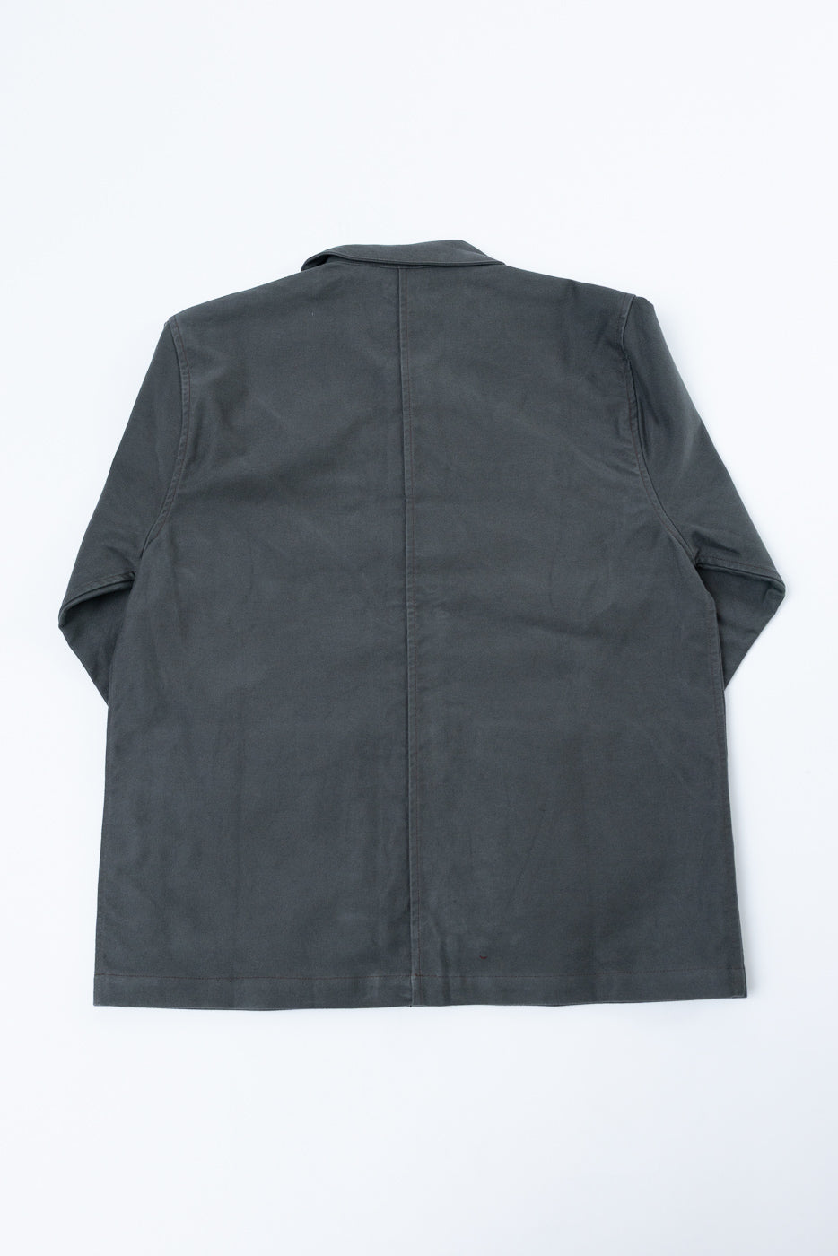 Back view flat lay of a dark grey casual cotton jacket showing the collar and hem.