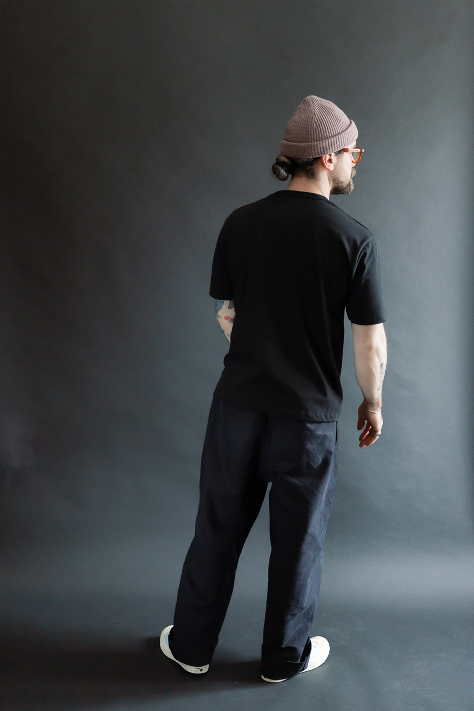 Full body rear view of male model 5'9