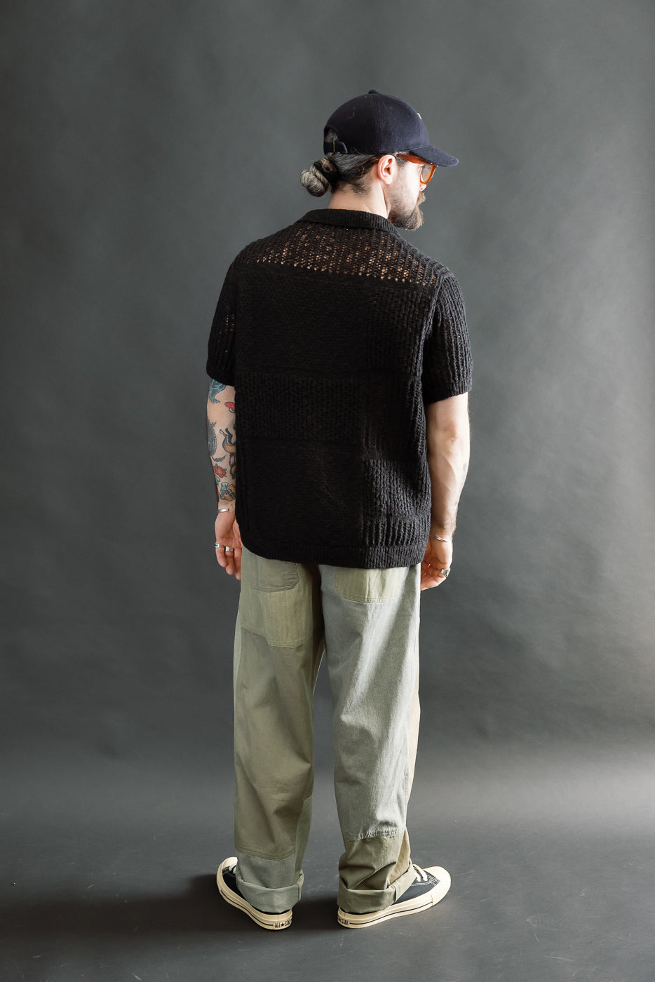 Full body rear view of male model 5'9