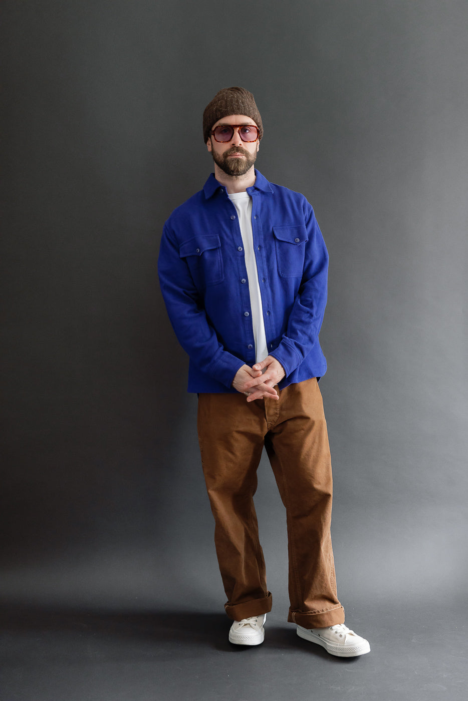 Full body front view of a male model, 5'9