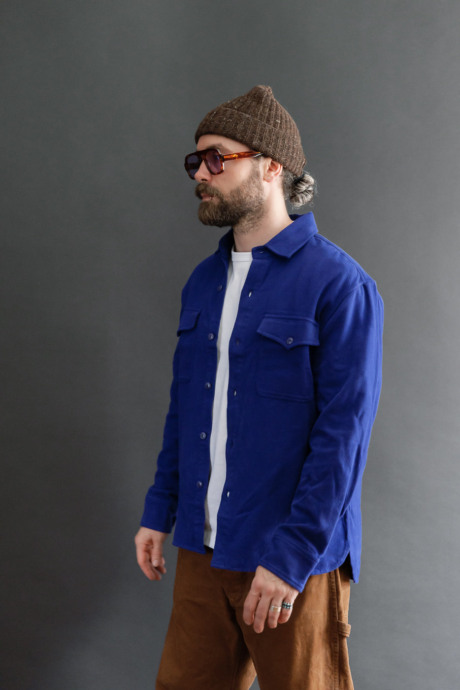 Full body side view of a male model, 5'9