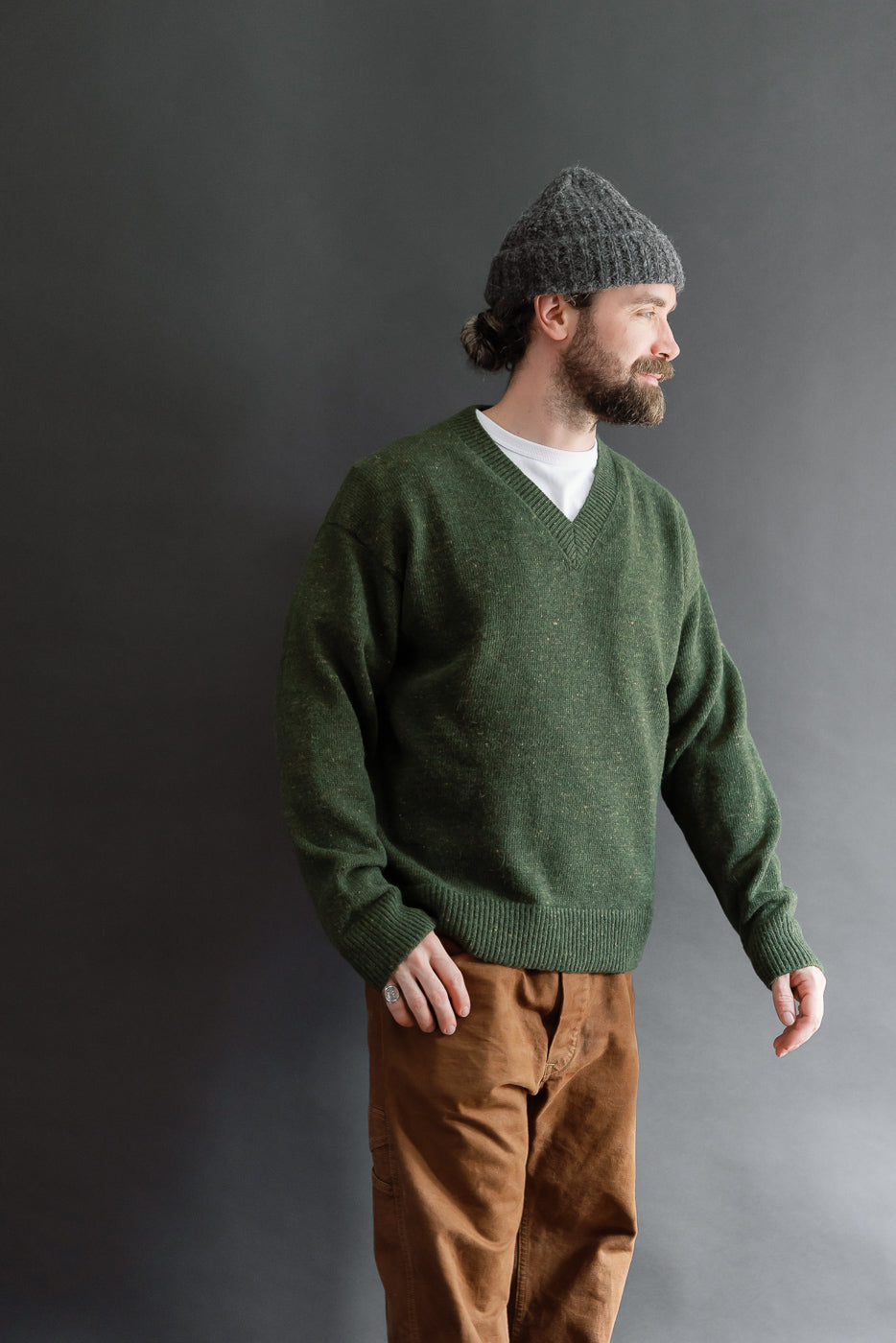 Full body side view of a male model, 5'9