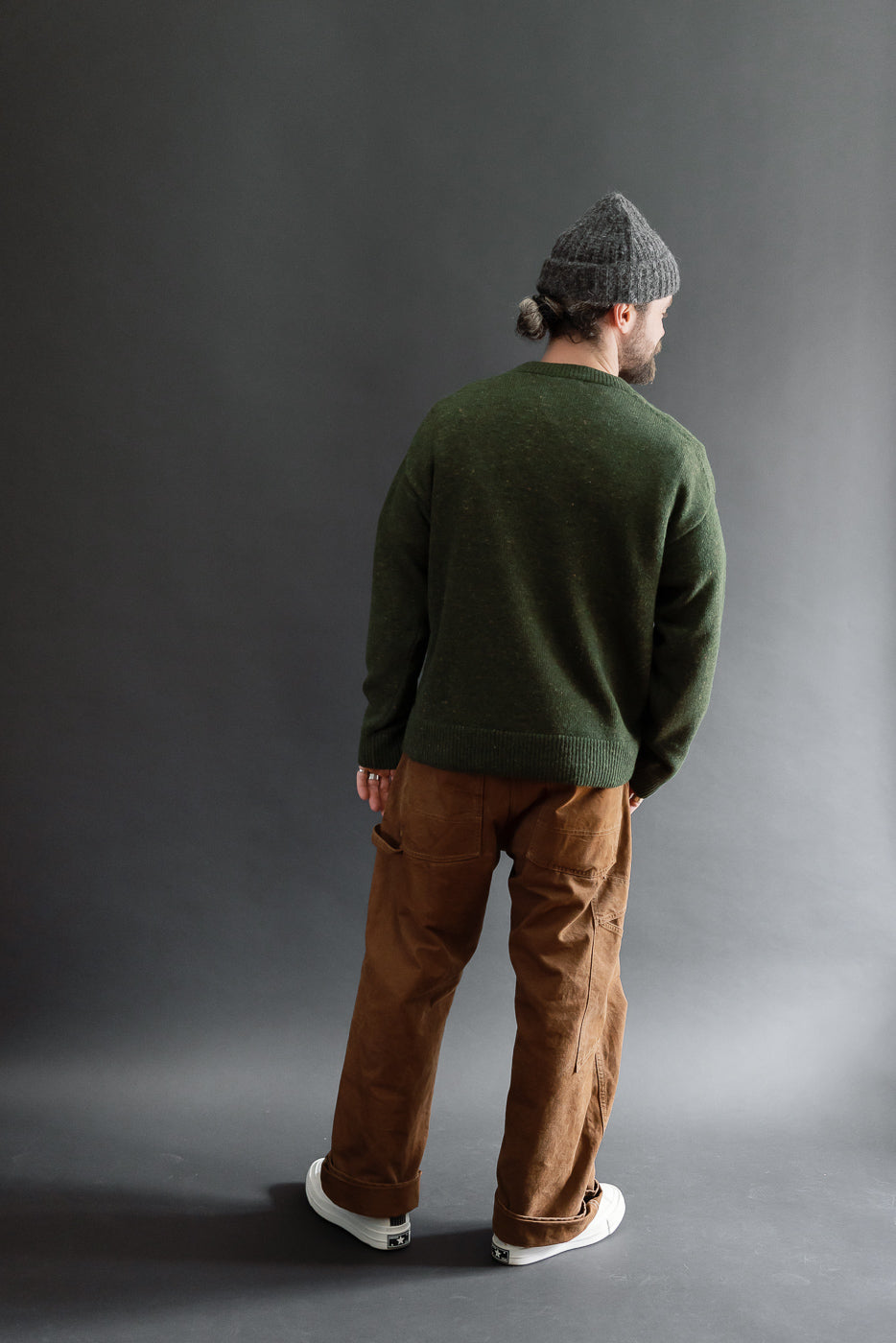 Full body back view of a male model, 5'9