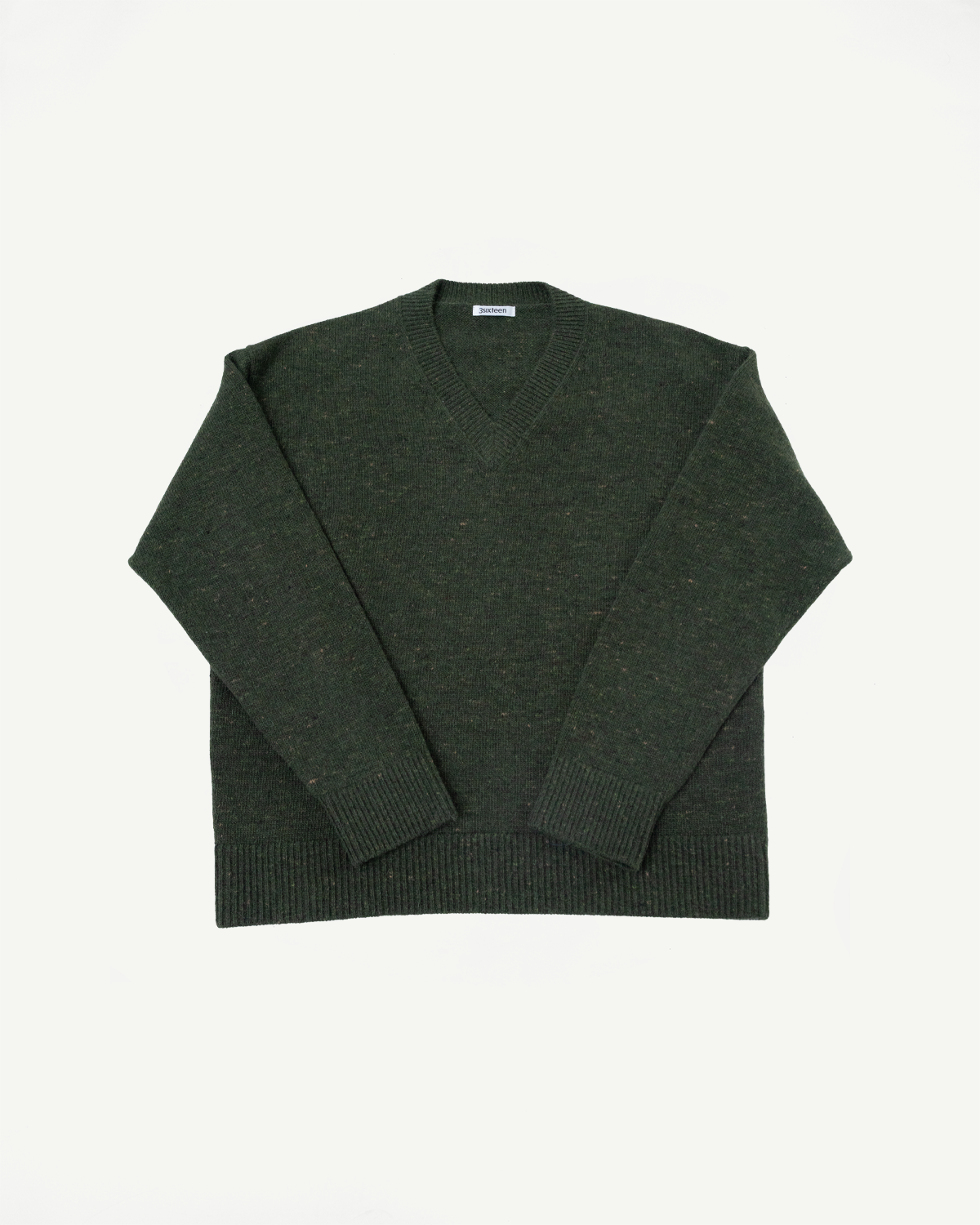 Front view flat lay of a dark green v-neck knit sweater with ribbed hem and cuffs.