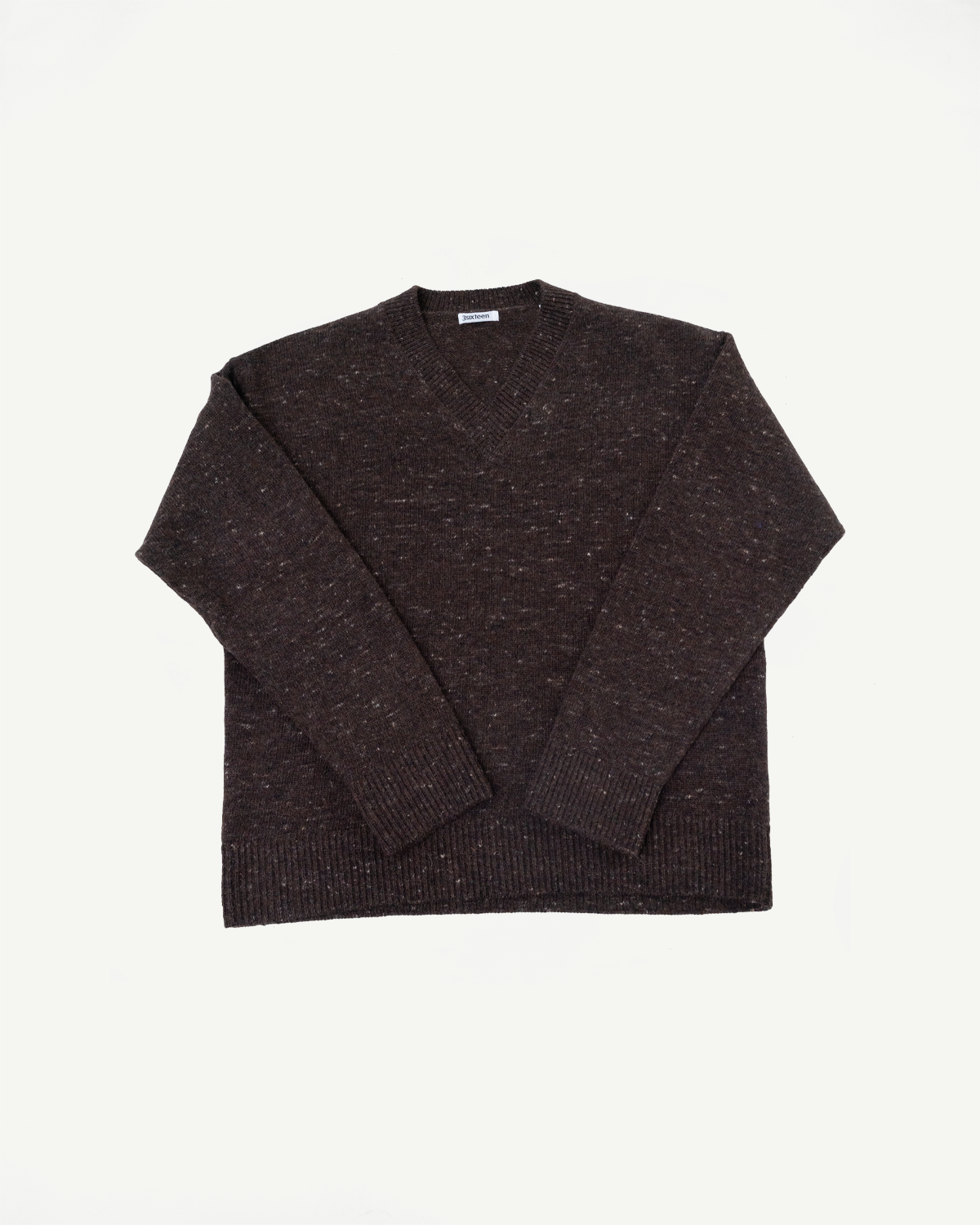 Flat lay front view of a dark brown speckled v-neck knit sweater.