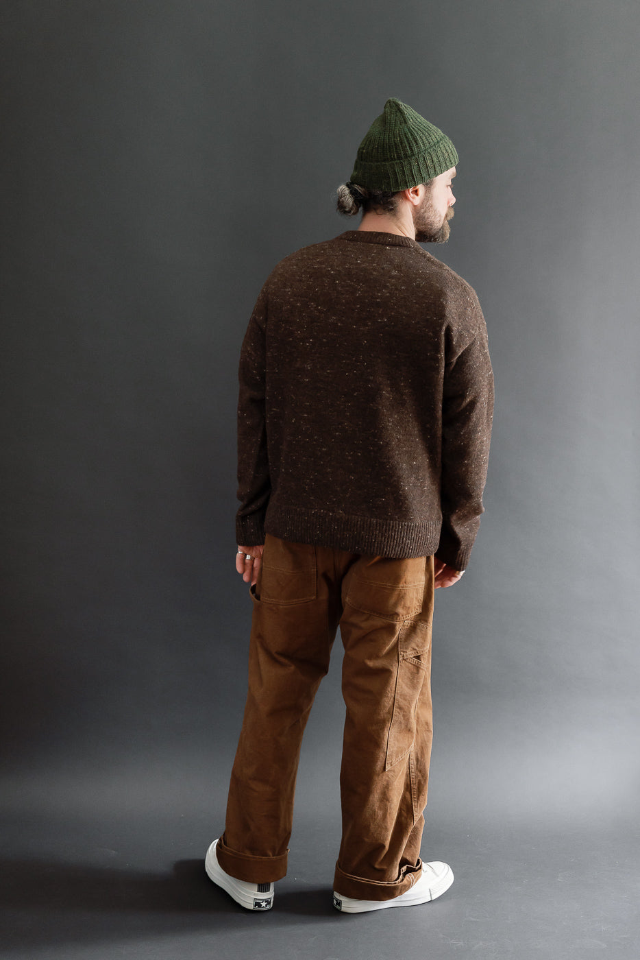 Full body back view of a male model, 5'9