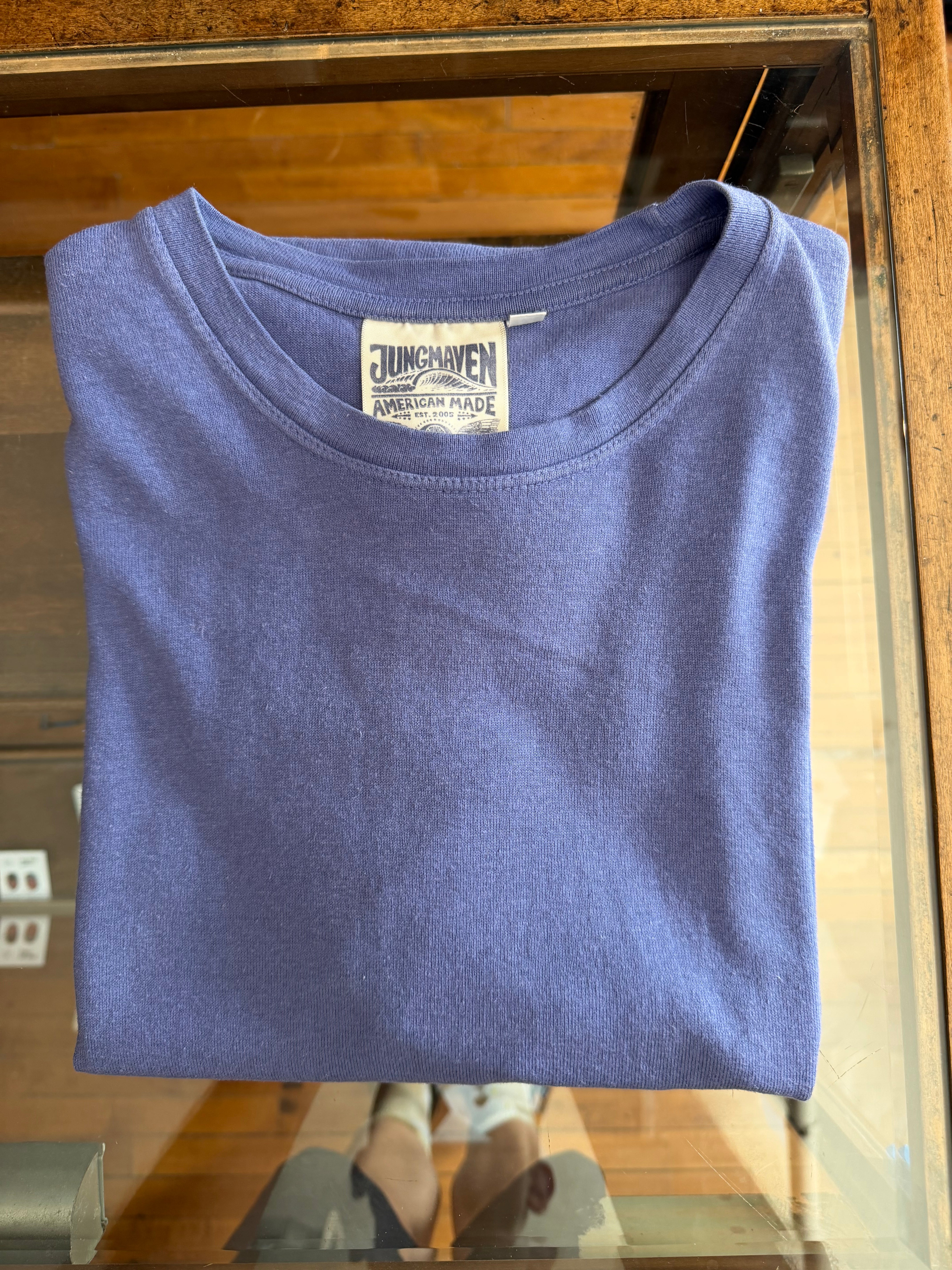 Purple t-shirt flat lay, front view, showcasing Jungmaven tag and ribbed crew neck.