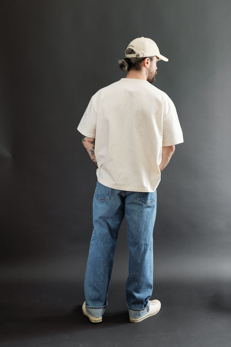 Full body back view of a male model, 5'9