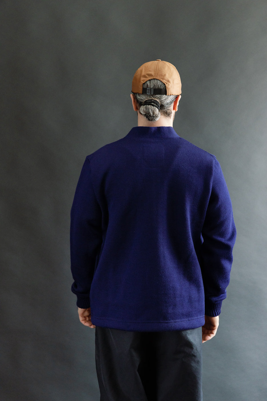 Back view, full body of male model 5'9
