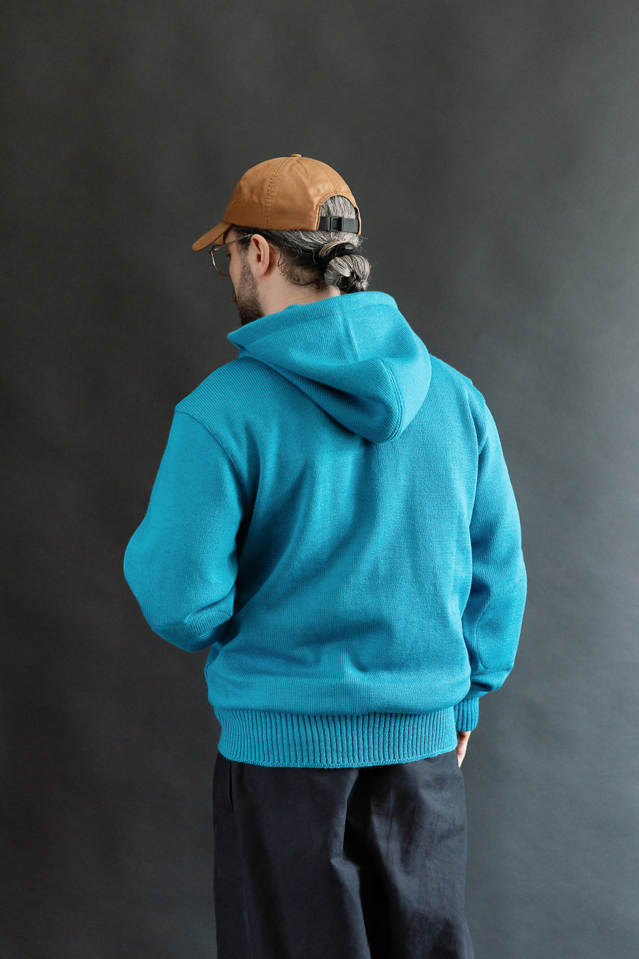 Back view mid-shot of male model 5'9