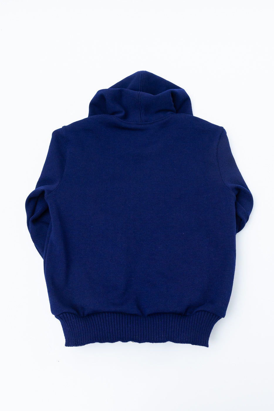 Flat lay of purple full-zip moto hoodie, back view showing hood and ribbed hem details
