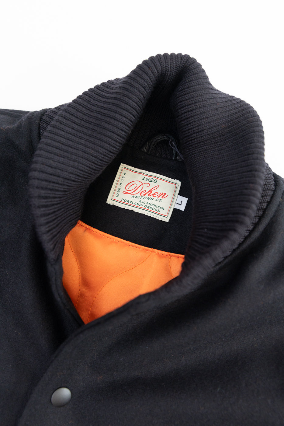 close up of black ribbed collar