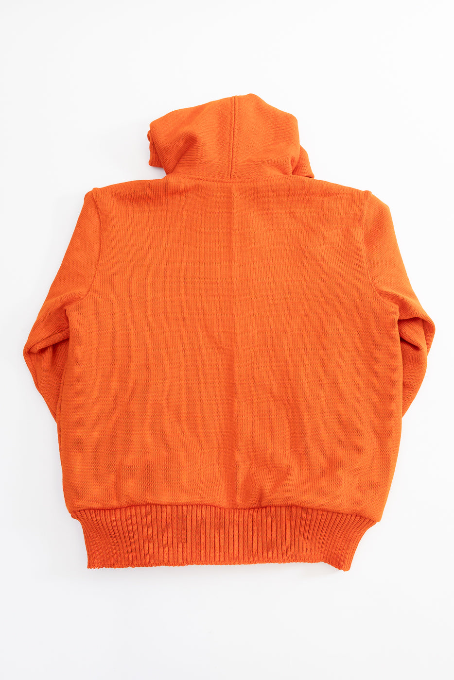 Orange knitted zip up hoodie flat lay back view on a white background