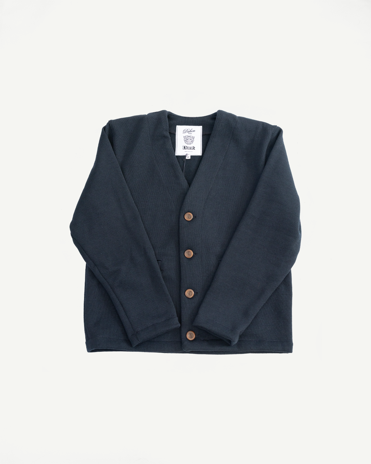 Black Dant slouchy cardigan with brown buttons on a white background