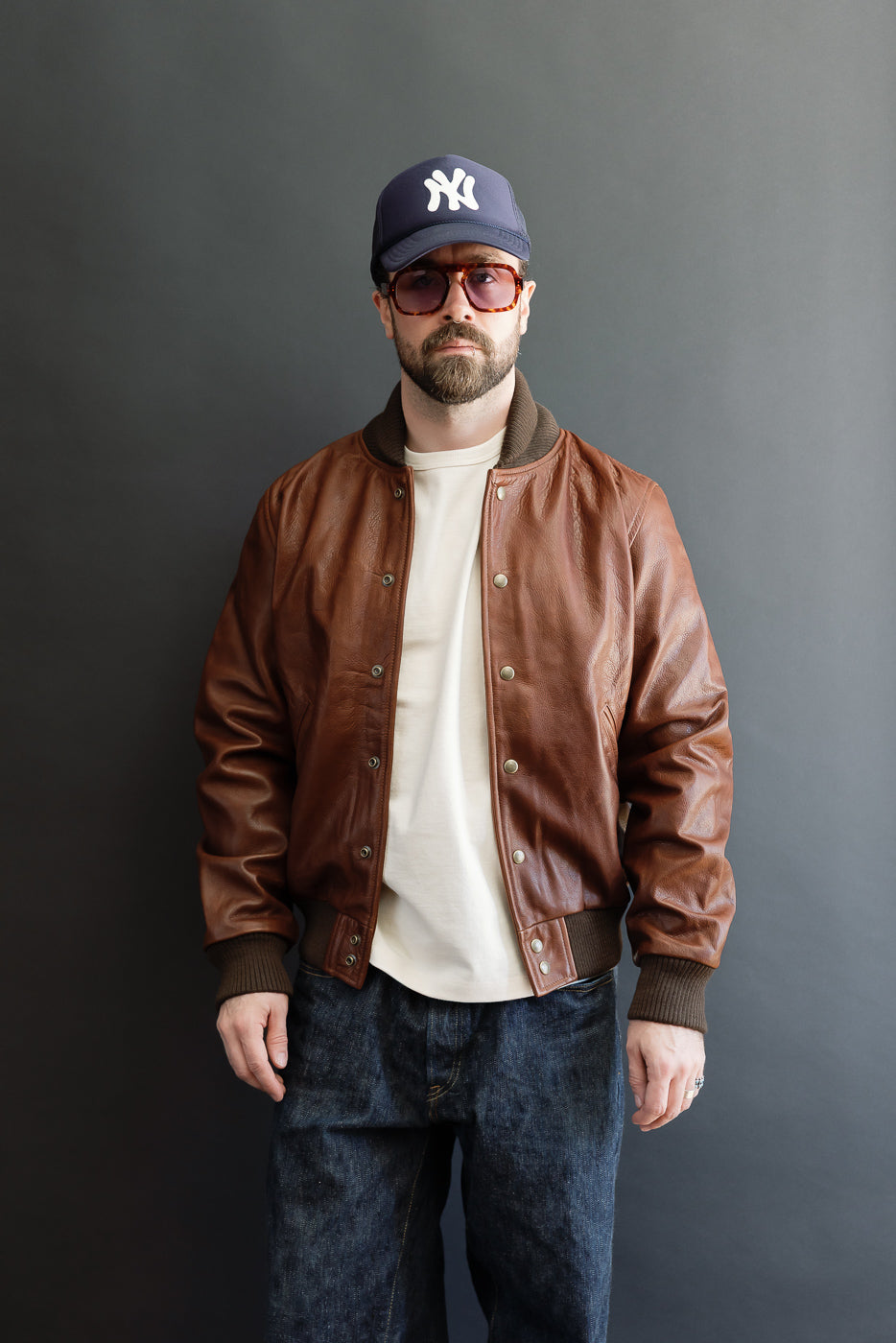 Full body front view of a male model, 5'9