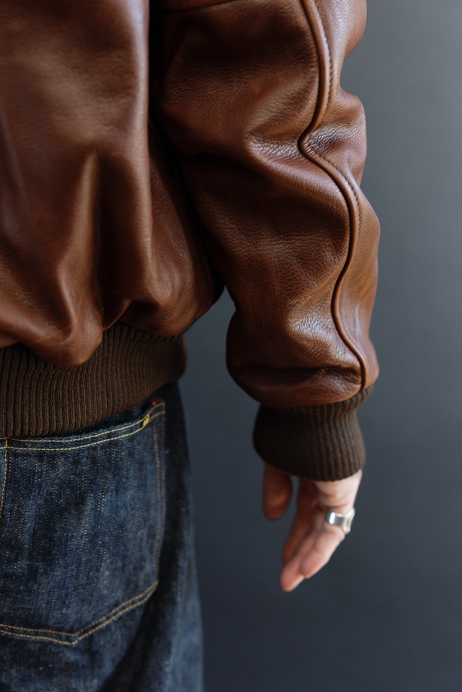 Close-up side view of a male model (5'9