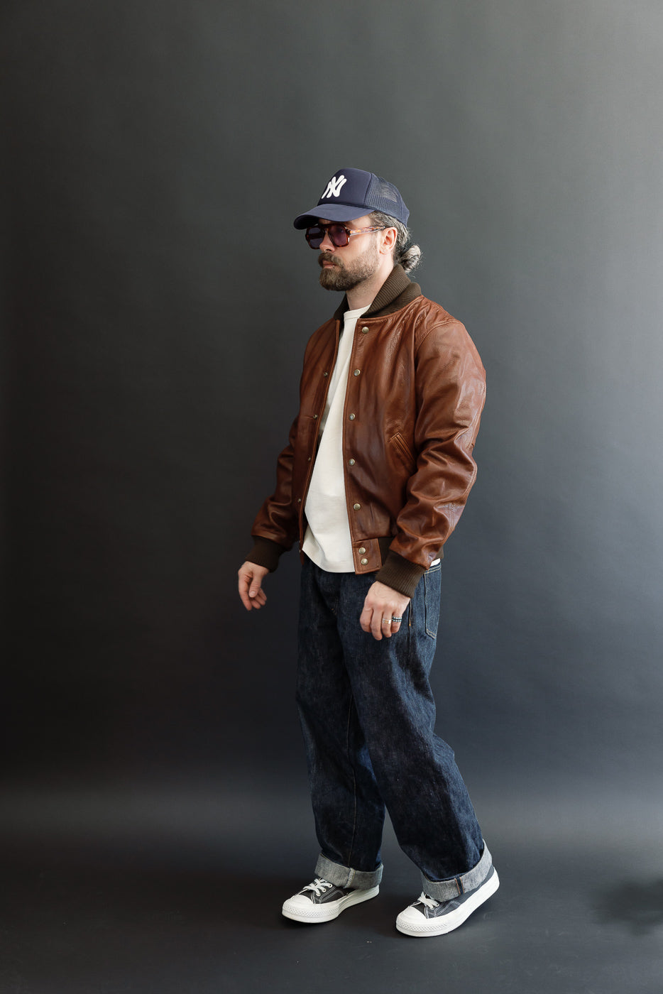 Full body side view of a male model, 5'9