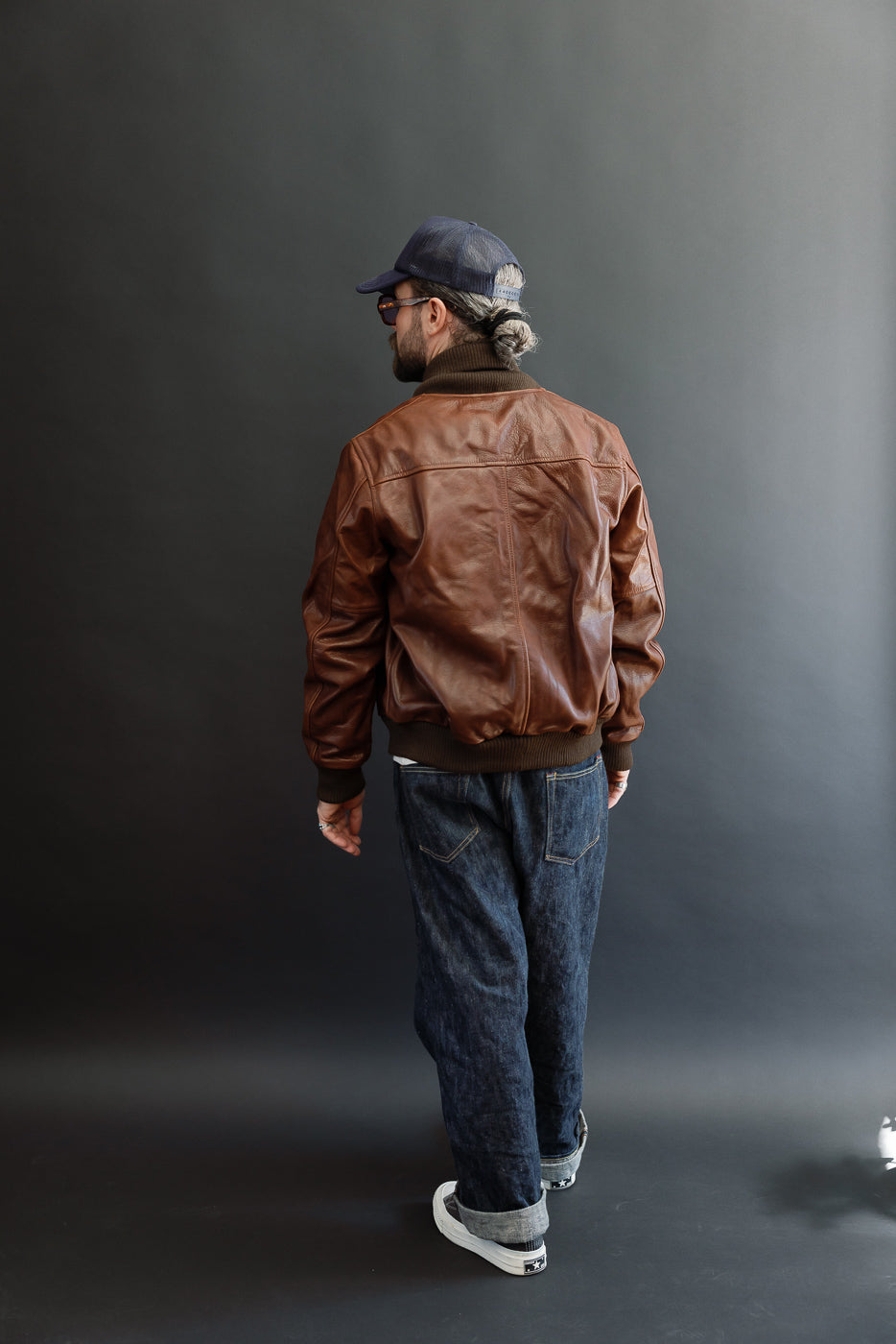 Full body back view of a male model, 5'9