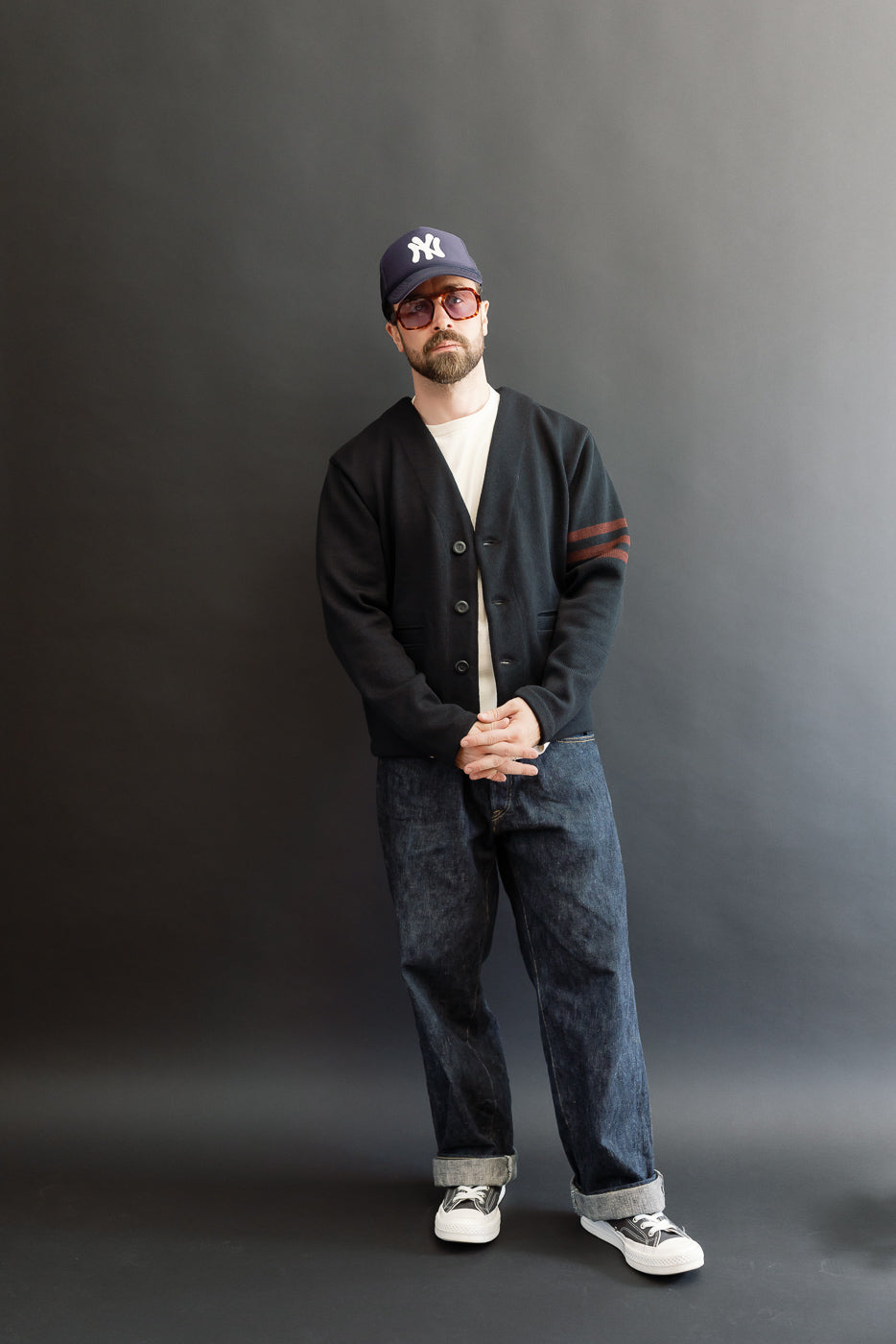 Full body front view of a male model, 5'9