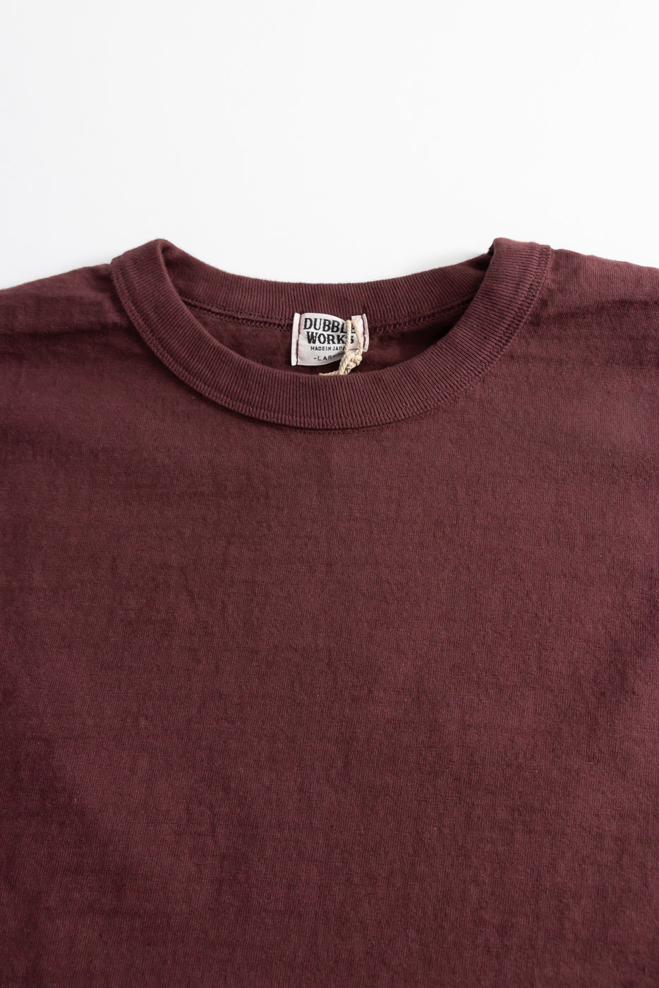 7.7oz Fallen Cotton Midweight T-Shirt S/S - Bordeaux, showcasing a rich maroon hue with a crew neck and visible DUBBLE WORKS label, laid flat against a white background.