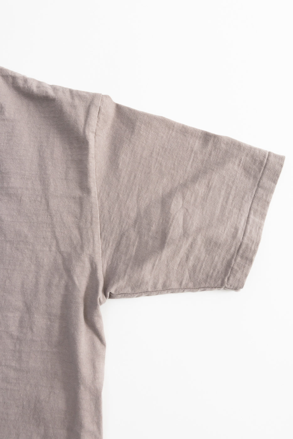 7.7oz Fallen Cotton Midweight T-Shirt S/S - Grey, featuring a muted taupe/beige hue, laid flat to show its recycled cotton slub jersey texture and classic short sleeve design on a white background.