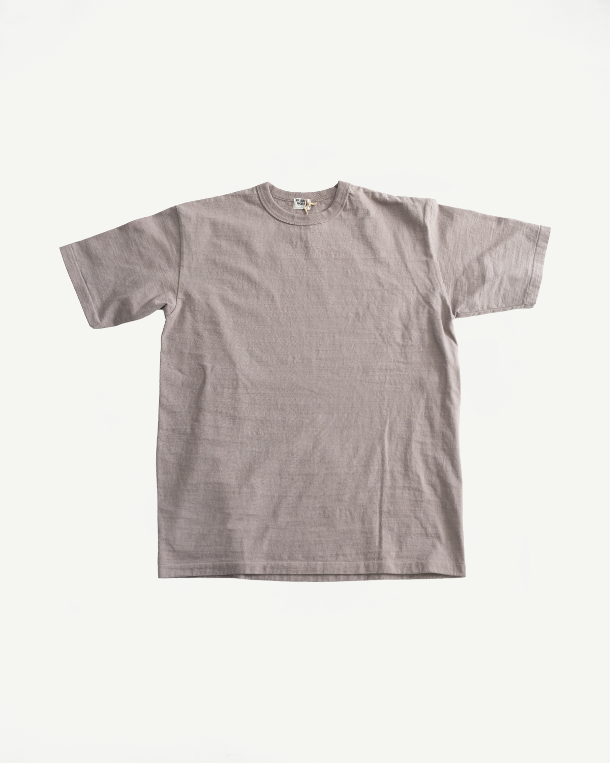 7.7oz - Fallen Cotton Midweight T-Shirt S/S - Grey, laid flat showcasing its plain, short-sleeve crew-neck design and textured recycled cotton slub jersey, emphasizing its classic silhouette and clean construction.