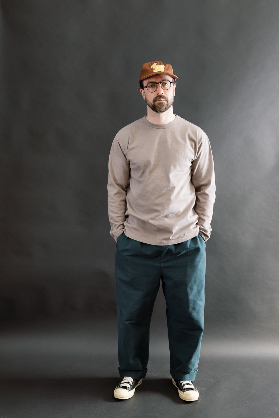 Full body front view of male model, 5'9