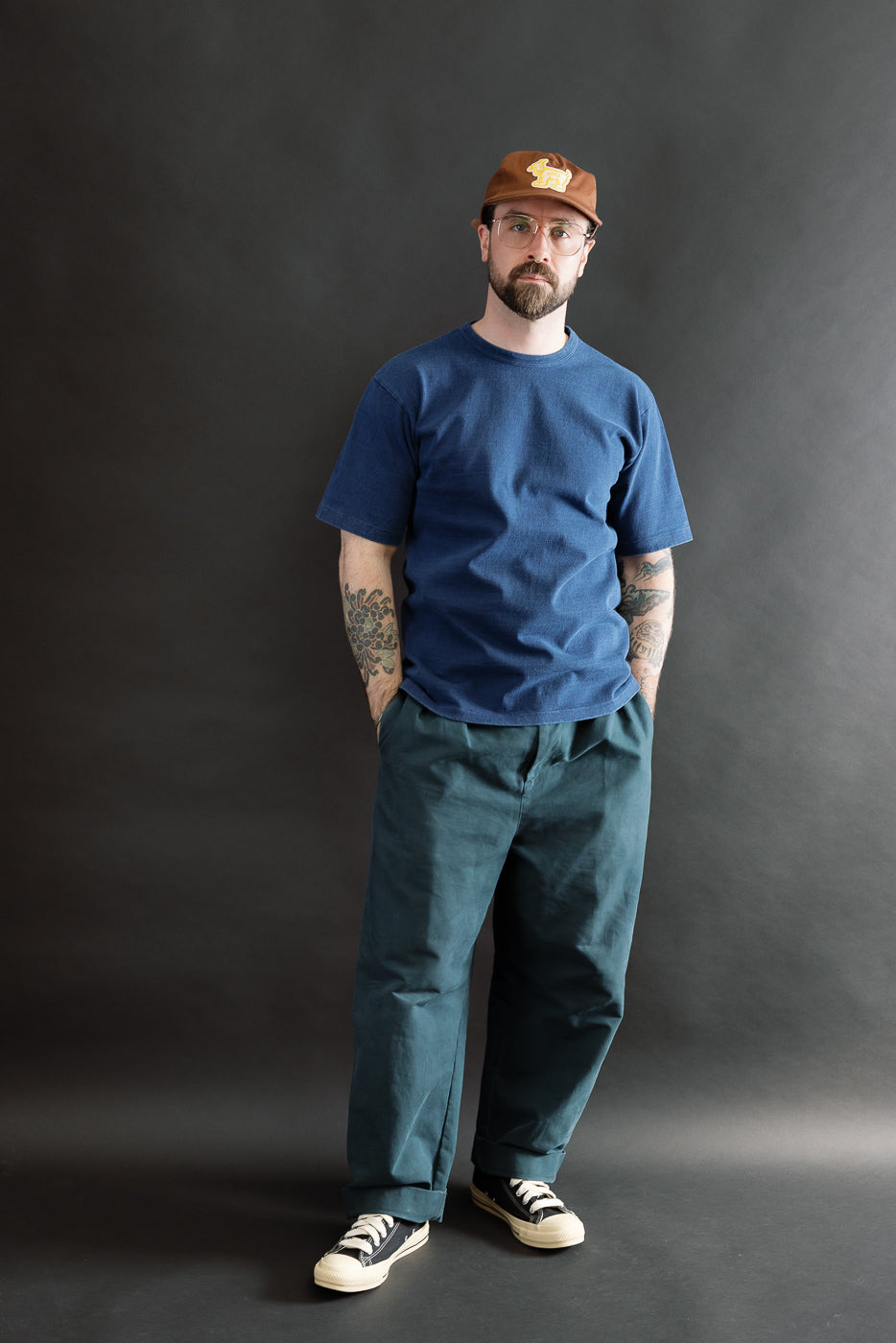 Full body front view of male model 5'9