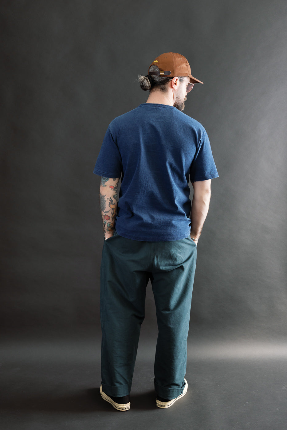 Full body back view of male model 5'9