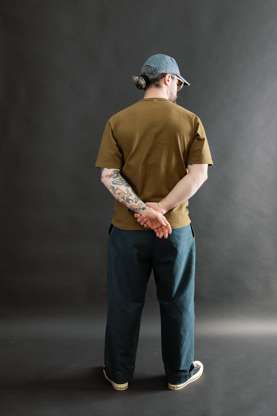 Full body rear view of male model 5'9