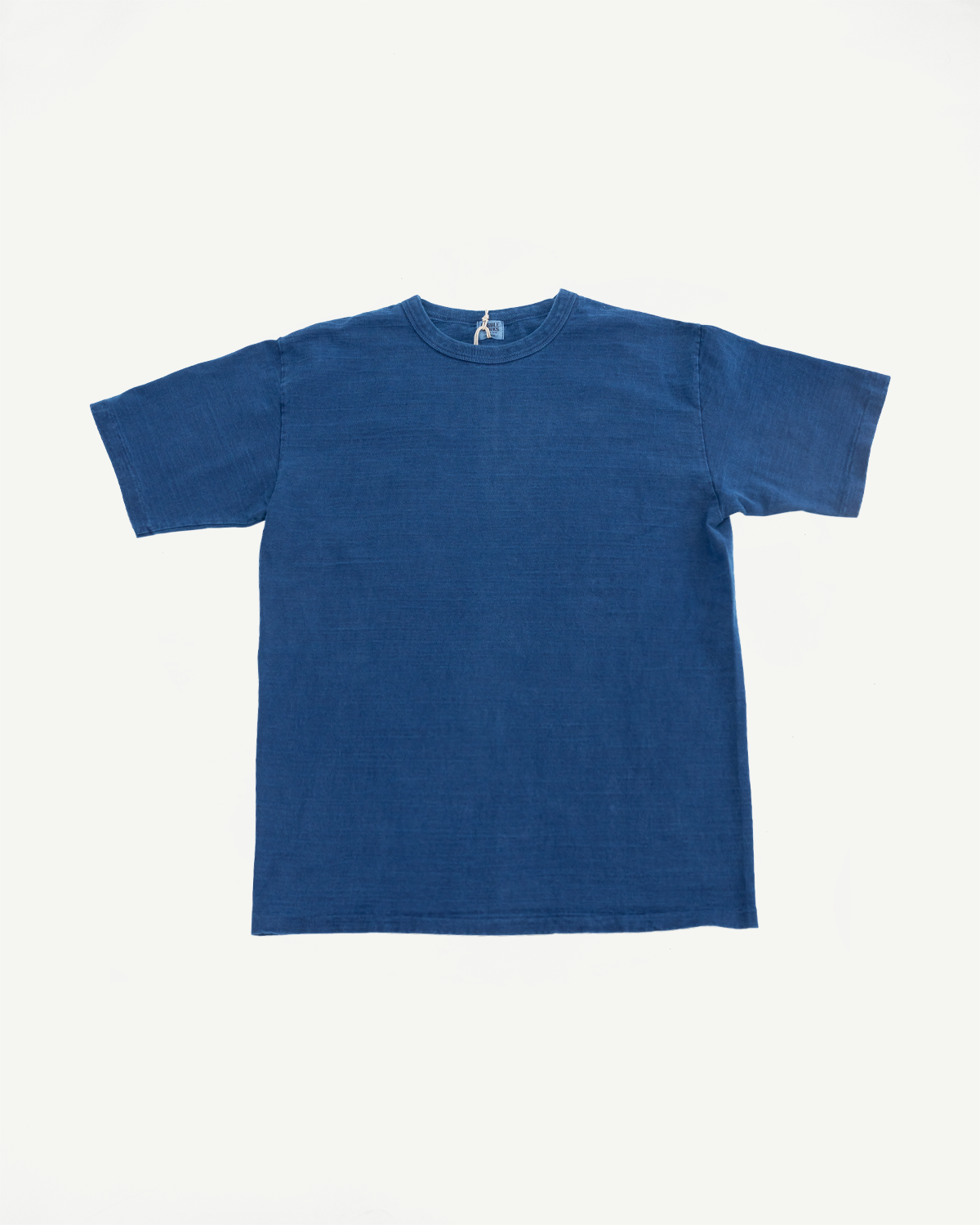 Flat lay of Dubble Works indigo short sleeve tee, front view, showing crew neck and midweight cotton fabric