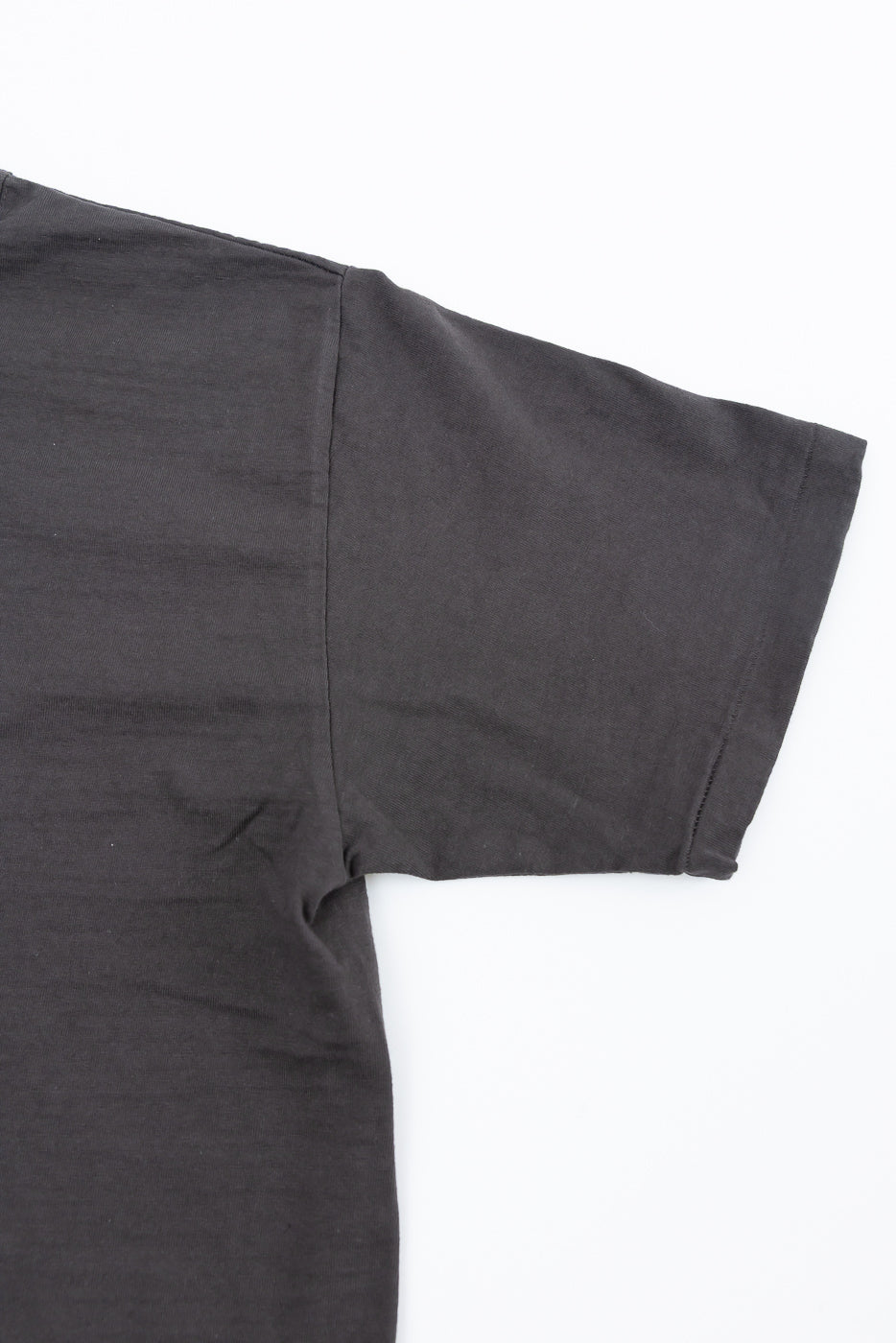 Close-up of Dubble Works Fallen Cotton midweight tee in Sumikuro, flat lay front right sleeve detail.