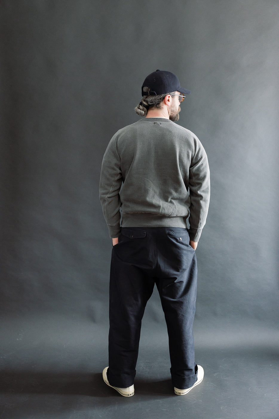 Full body back view of male model 5'9